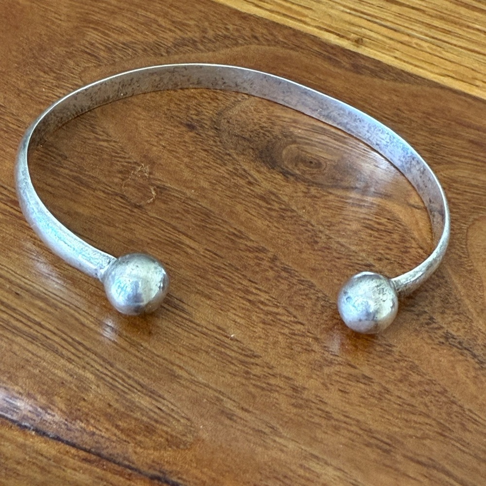 Sterling silver cuff bracelet with ball end